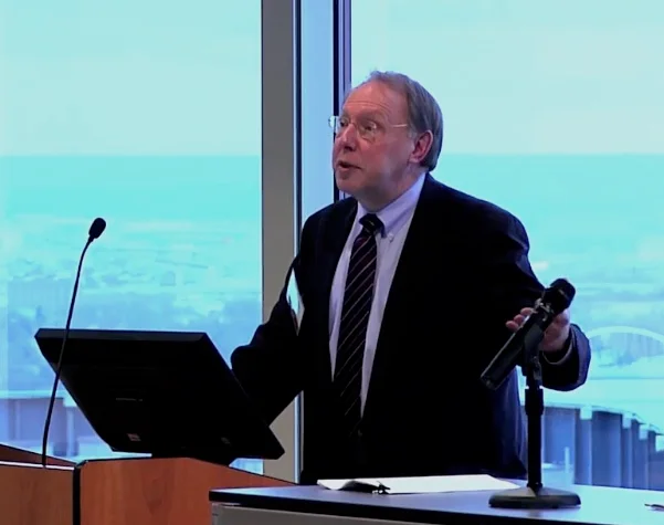 Jeff giving a talk at a conference